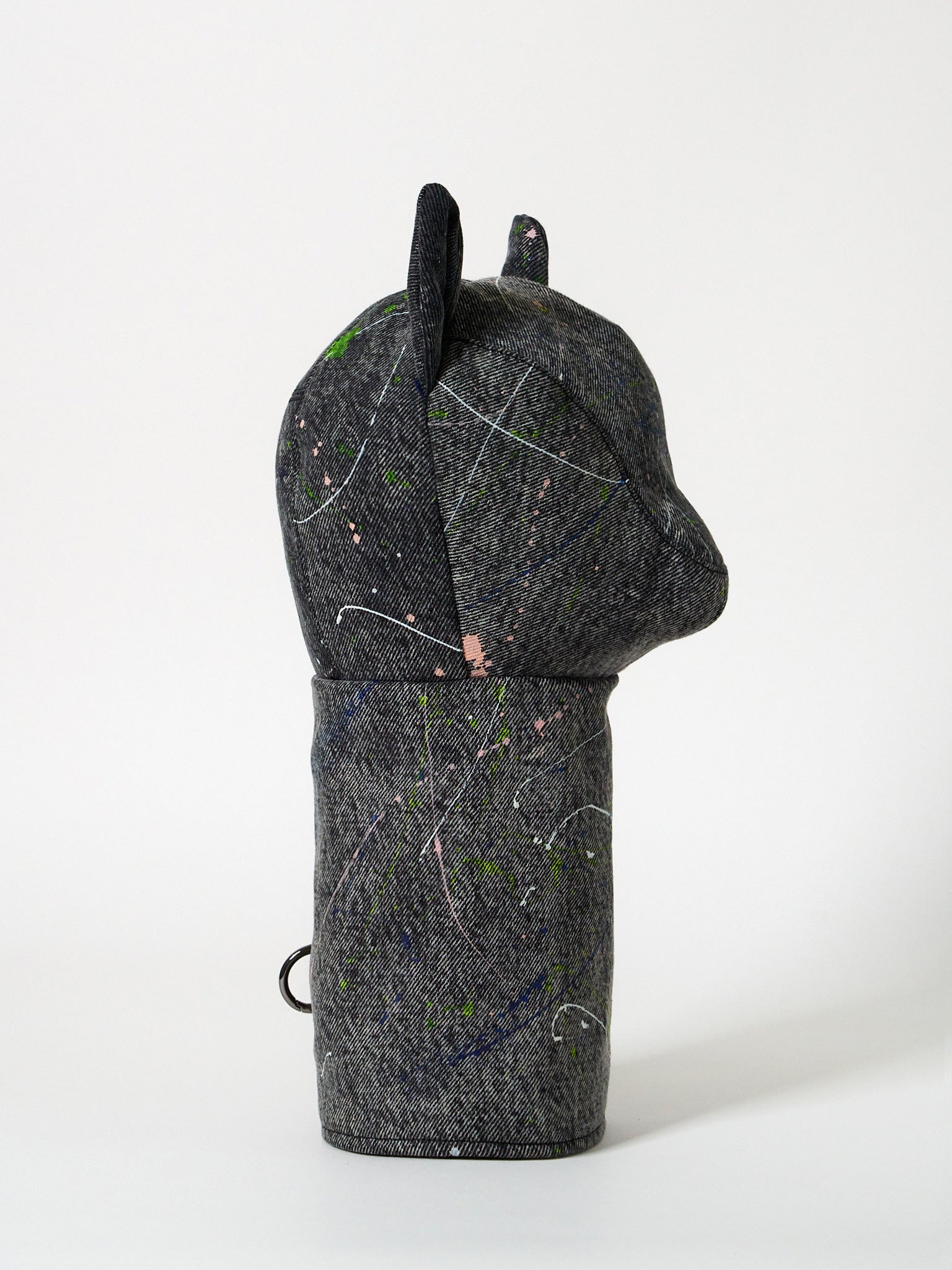 Structured dark gray denim golf driver headcover featuring an abstract Jackson Pollock-inspired paint-splatter design.