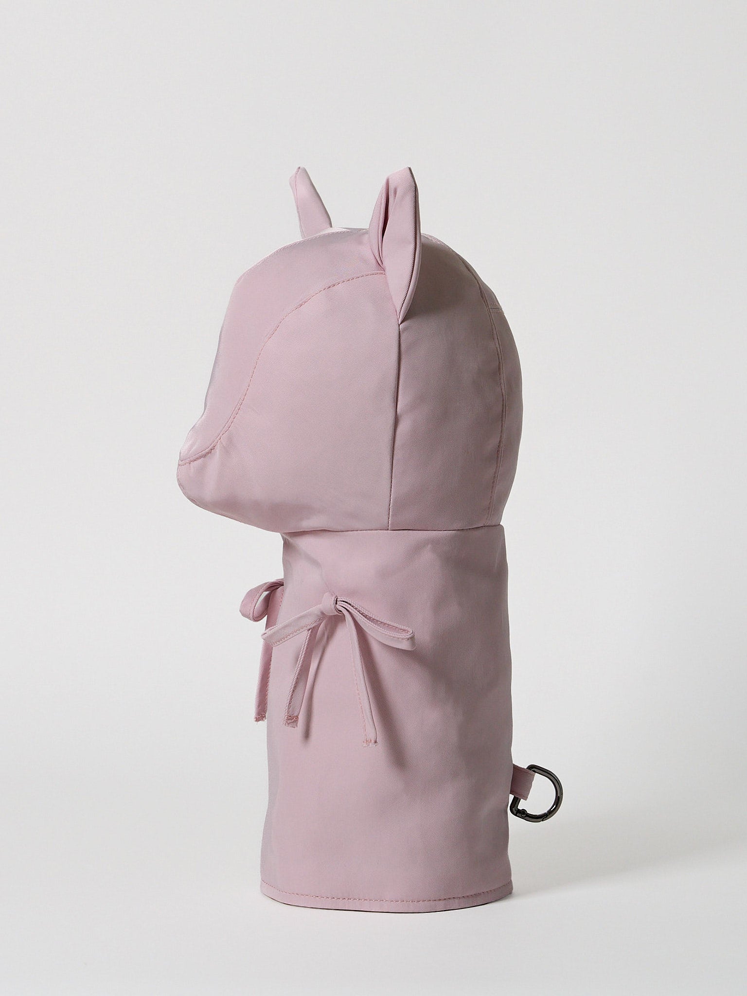 A high-performance golf driver headcover made from smooth, satin-textured nylon fabric with two playful pink ribbons sewn onto the front.