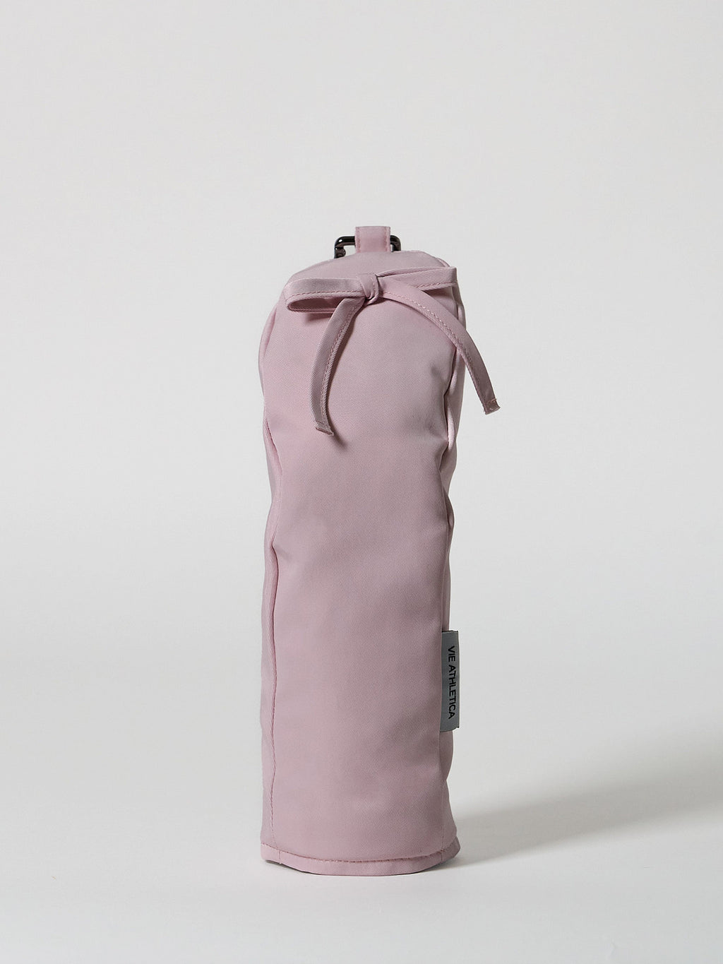 Structured pink nylon golf hybrid headcover featuring a decorative ribbon accent and a solid brass D-ring buckle.