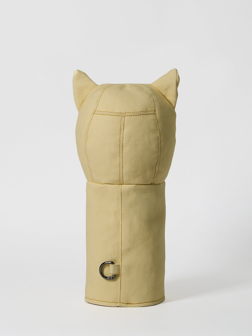 A structured golf driver headcover made from vibrant yellow denim, detailed with a playful mushroom patchwork design crafted from dark indigo denim.